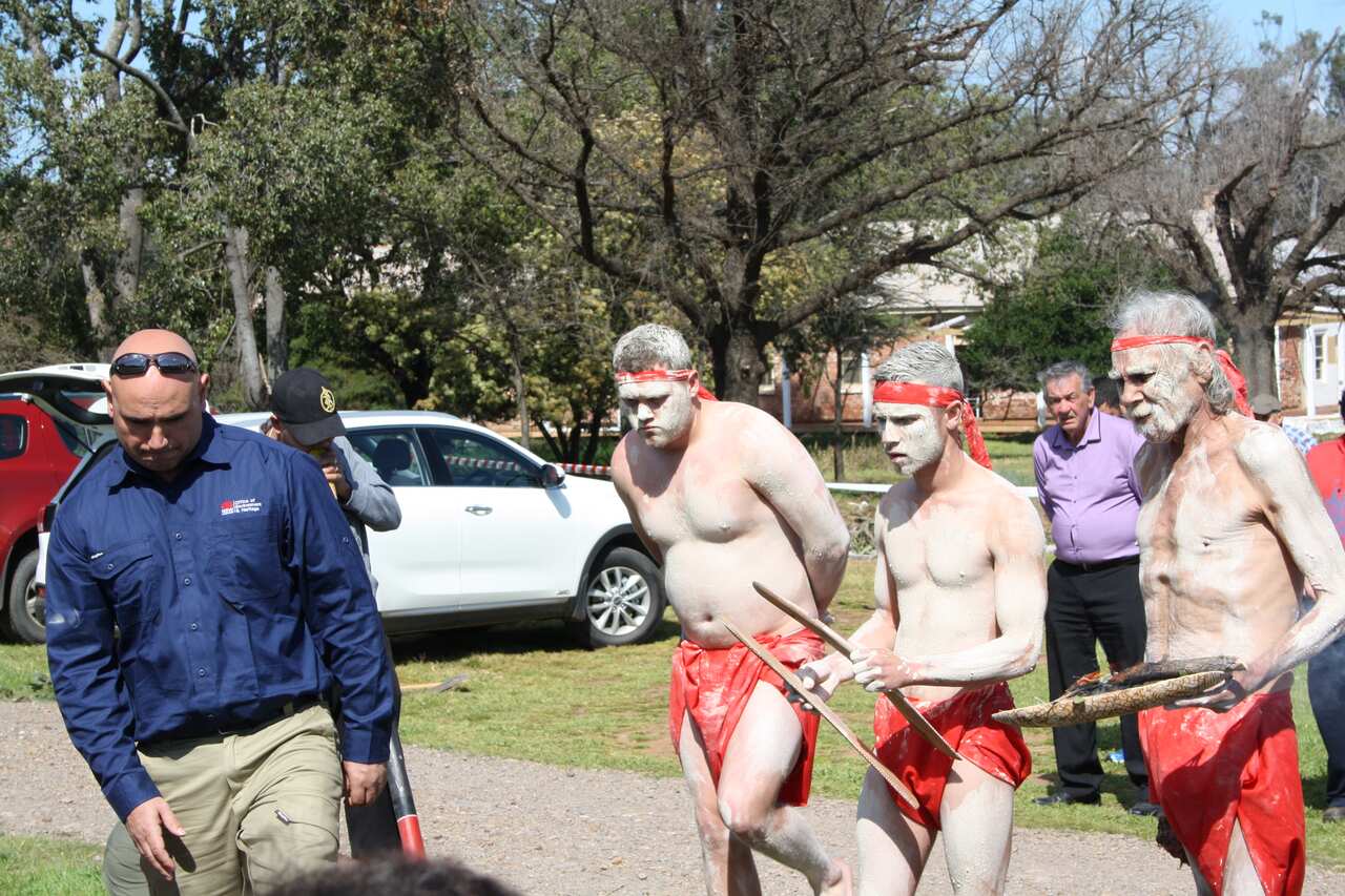 John Duggan with performers 