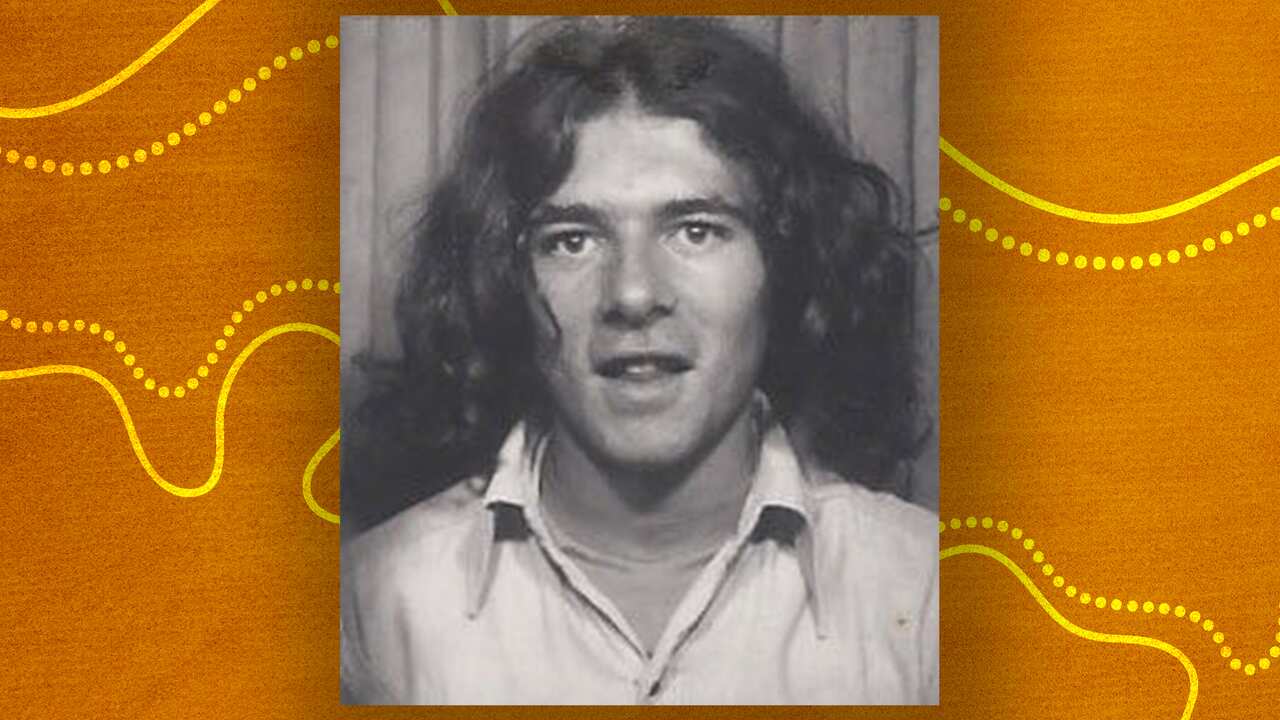 black and white headshot of long-haired, teenage John Maynard.