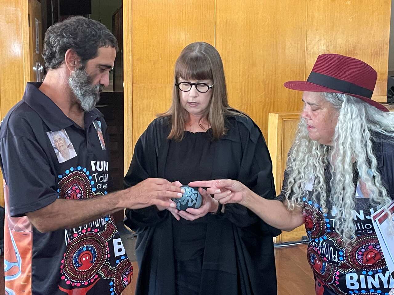 Kunja Traditional Owners giving the H Derrington a gift