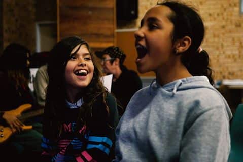 Two young Wallaga Lake locals practice their parts ahead of a special community concert tonight 