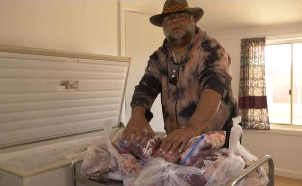 Leroy Johnson with kangaroo meat