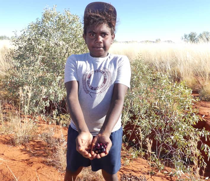 Indigenous students learning on country