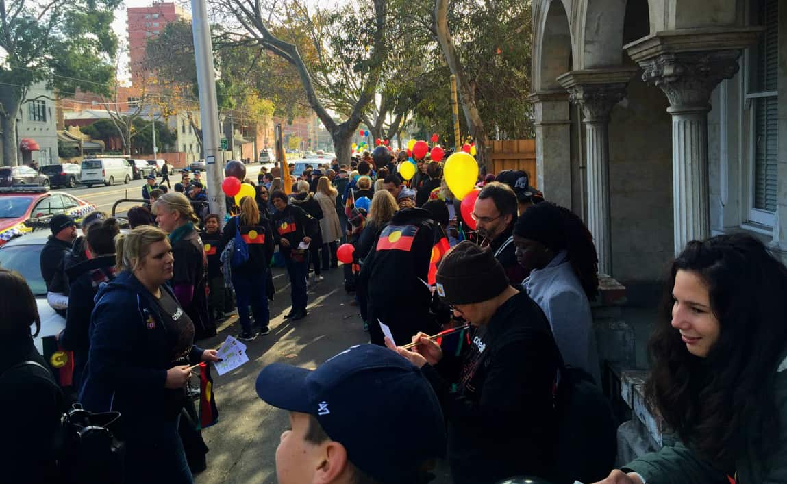 Marchers gather in Melbourne for NAIDOC Week 2016. 