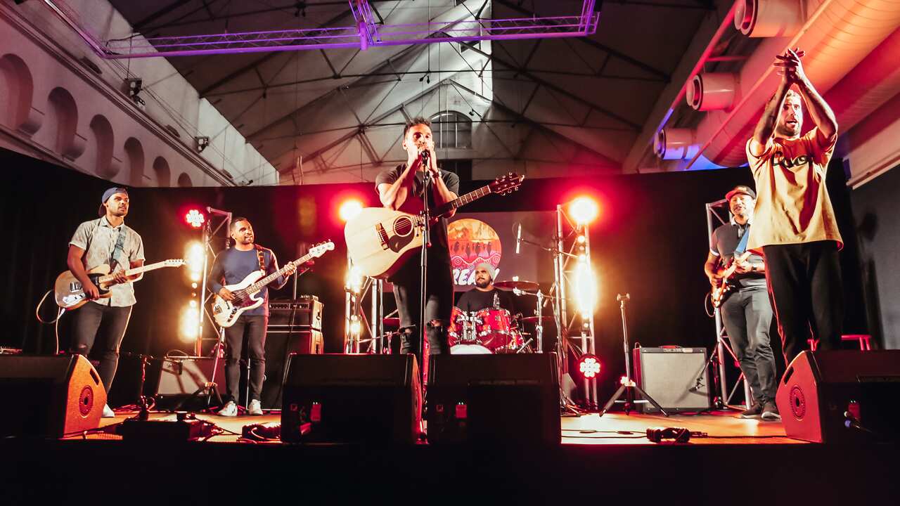 MRLN performing on stage.