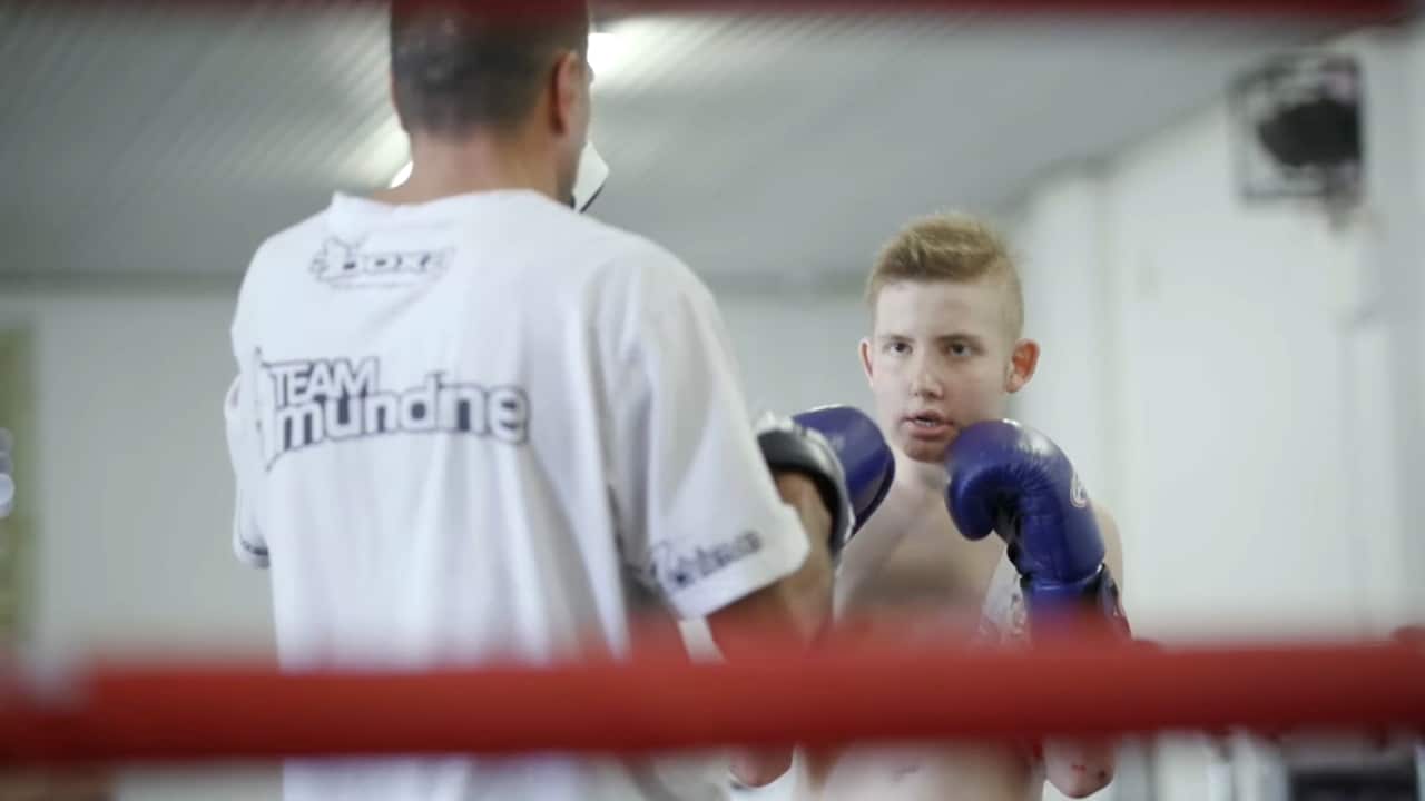 Anthony Mundine teaches Eli Chatfield some moves