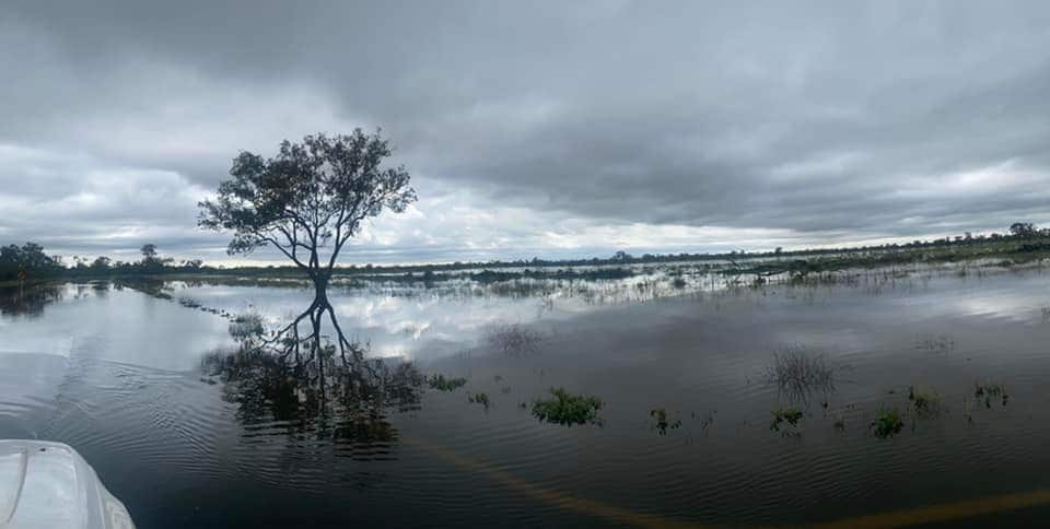 A road completely underwater on the outskirts of Mungindi, Queensland Australia. 