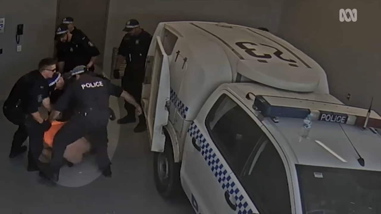 Group of officers kick and punch Indigenous man