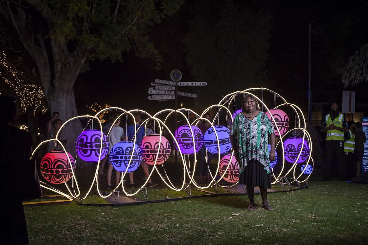 Lynette Pengarte Ellis with her light sculpture
