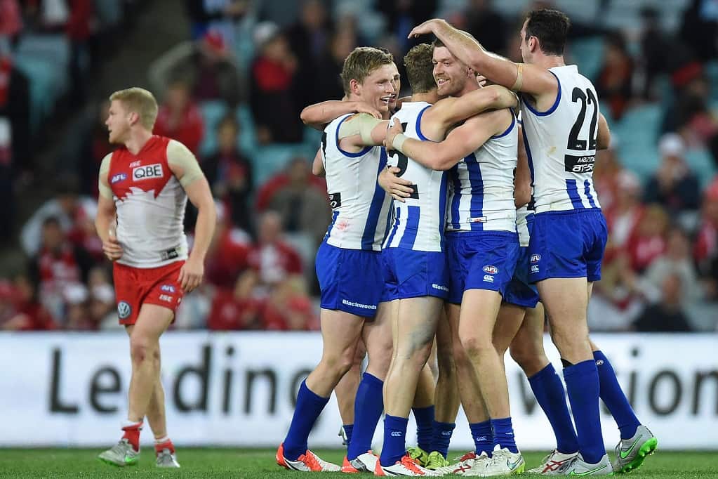 The Kangaroos celebrate their win