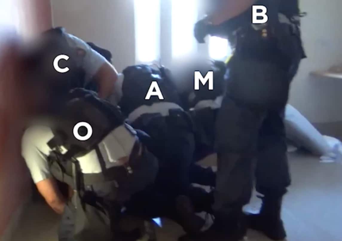 Officers at Long Bay Correctional Centre Hospital restrain David Dungay Jnr