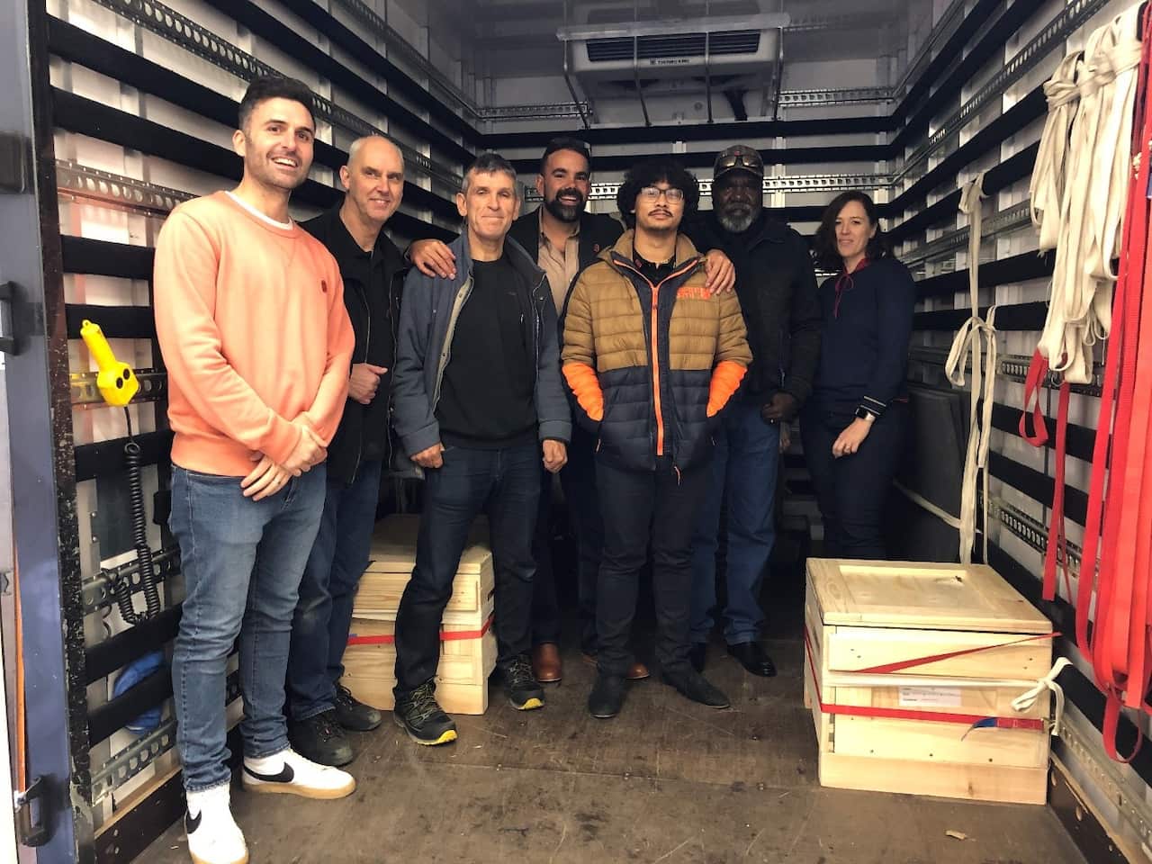 The AIATSIS & Manchester Museum delegation capture the moment the ancient and ceremonial artefacts are finally on their way home. Next stop Burketown.