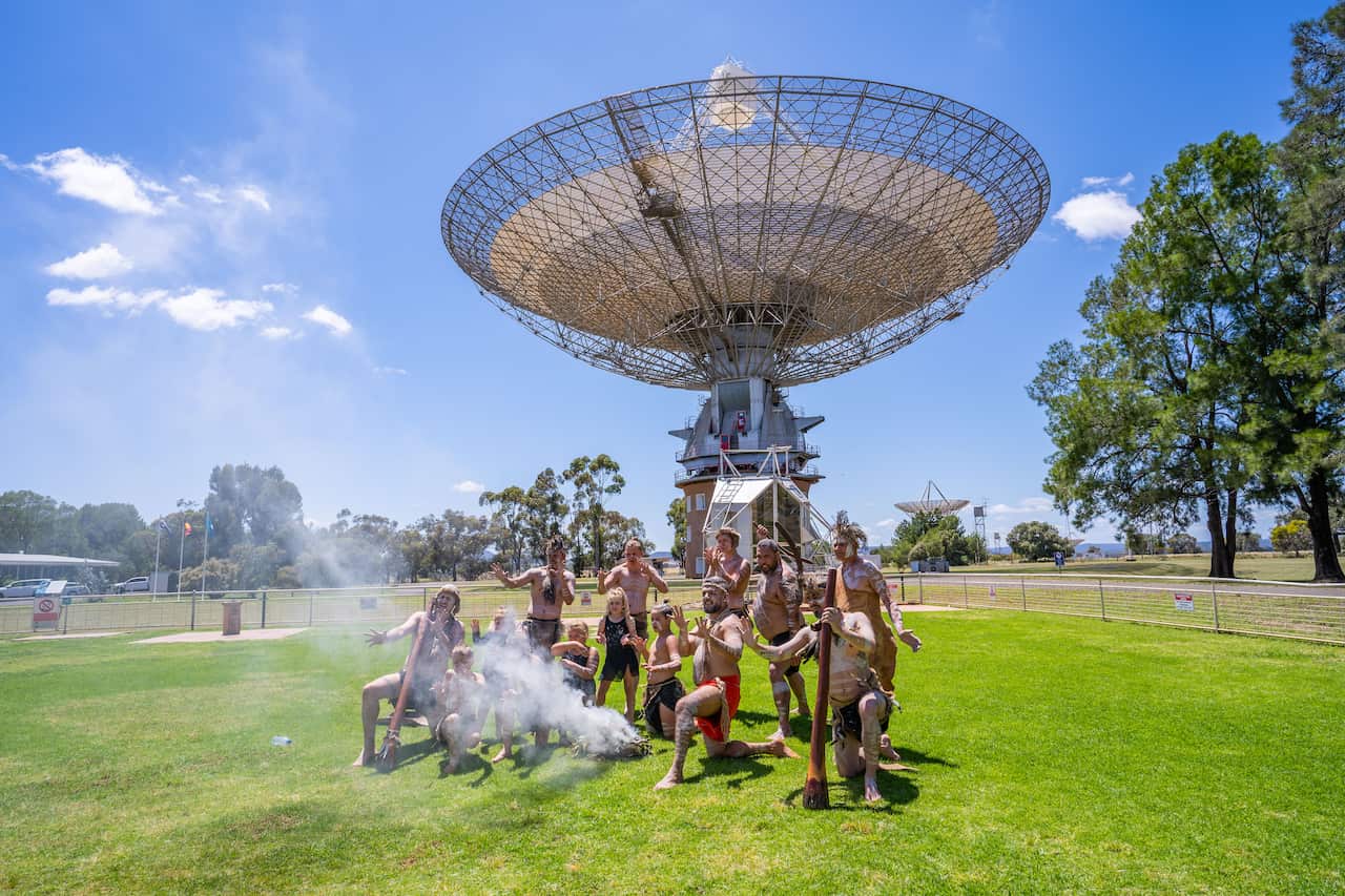Dancers at the Parkes radio telescope on its naming day.