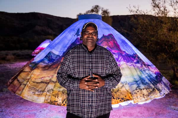 Parrtjima, light festival, Alice Springs, Australia - Opening Night Friday 23nd September 2016. Pictured is artist Reinhold Inkamala.Photo - James Horan for AGB Events