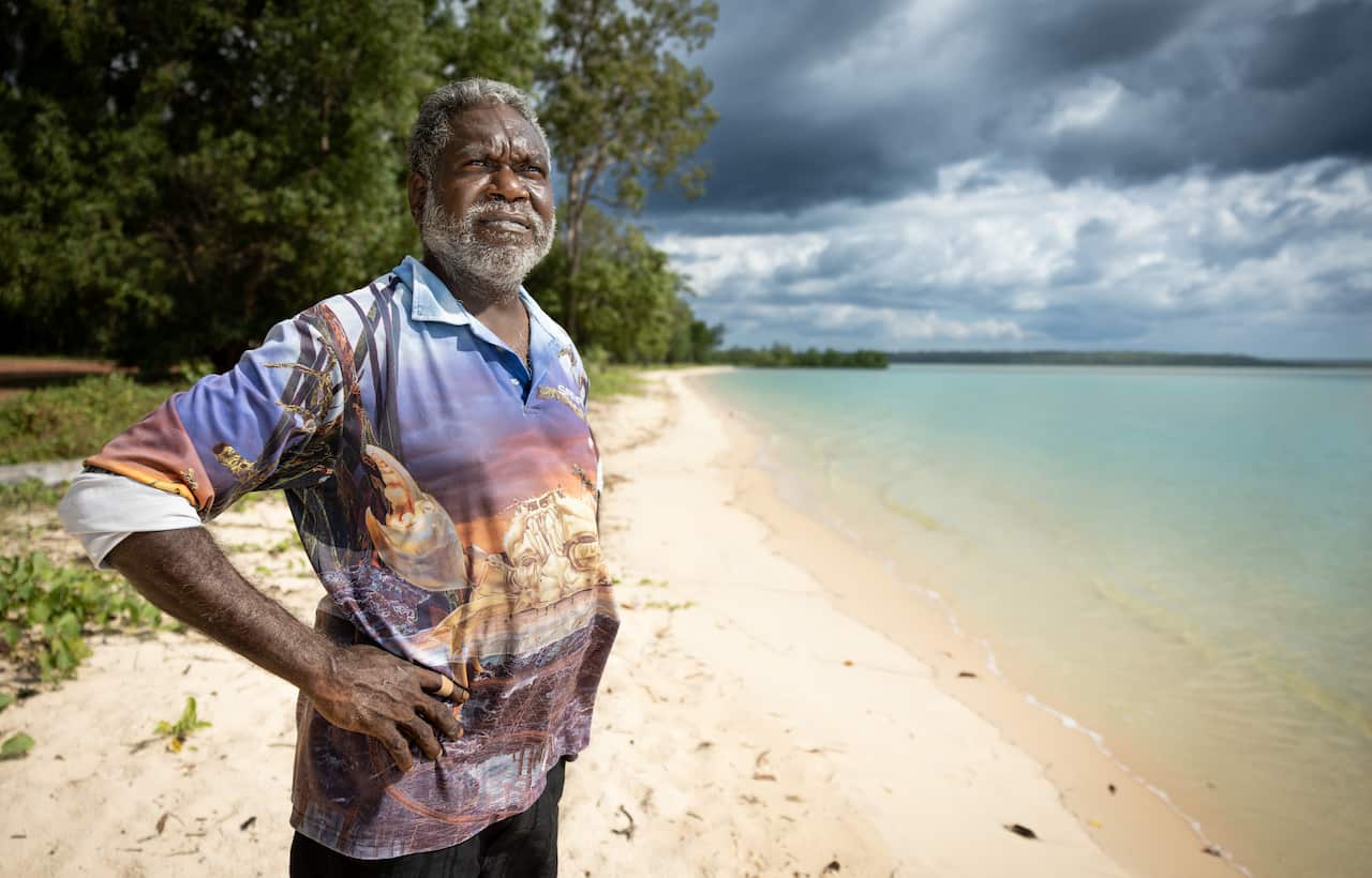 Dennis Tipakalippa stands by the shore line in the Tiwi islands.