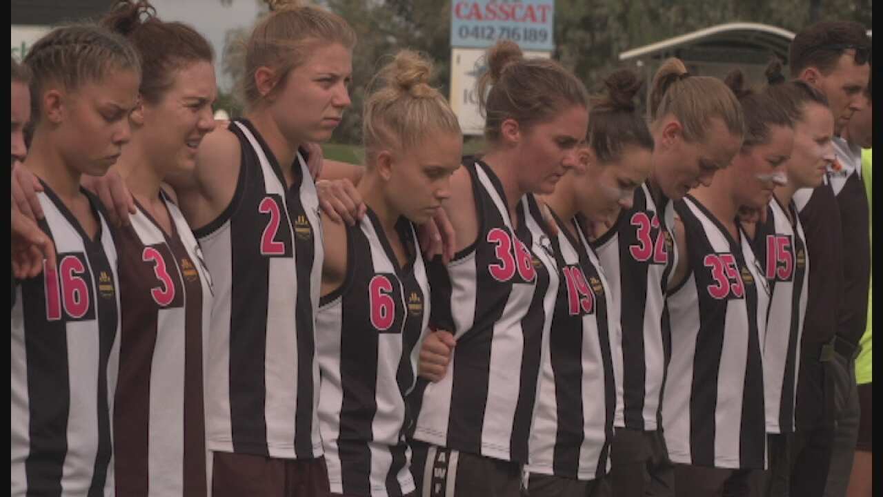 Courtney Ugle (fourth from left) with her teammates. 