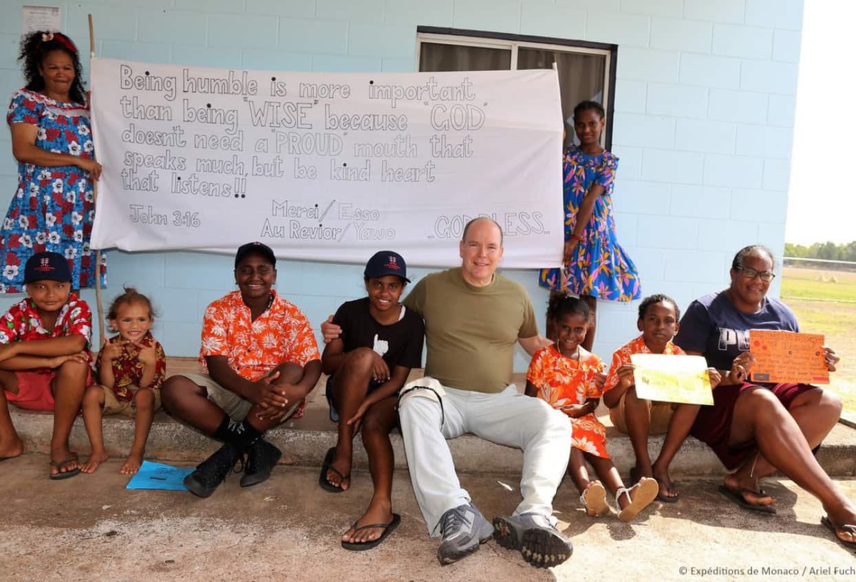 Prince Albert II with locals from Badu Island promoting Climate Change awarenes