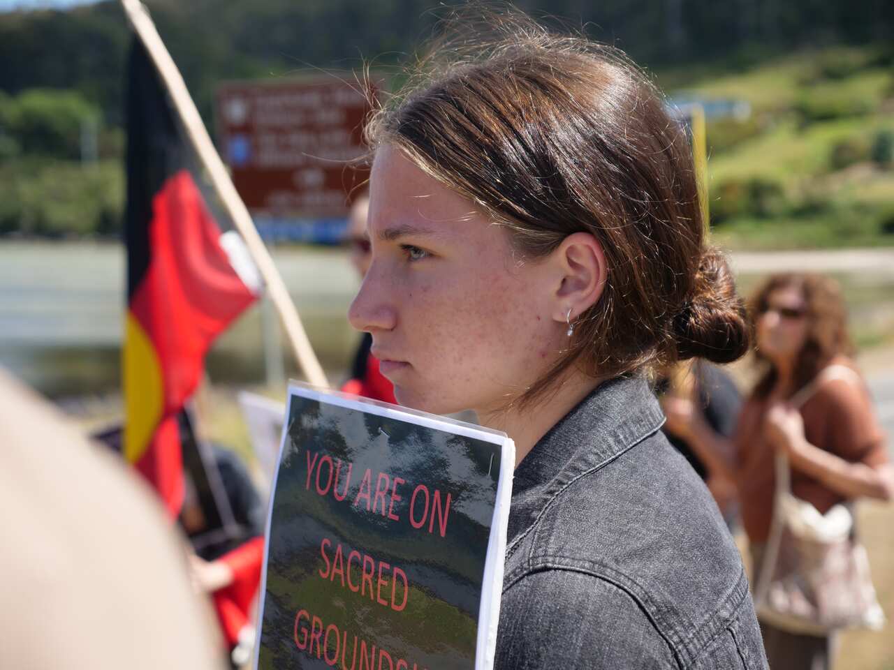 A protestor at the Eaglehawk Neck site on Monday