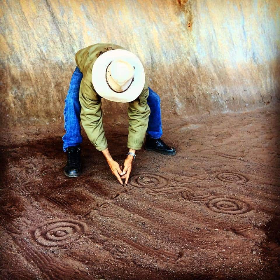 Uncle Vincent Forrester tells the Mala Men story at the base of Uluru