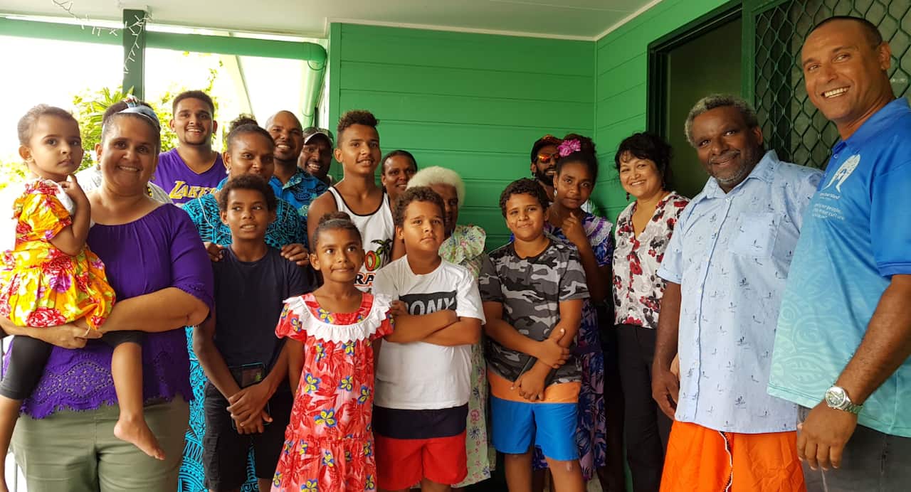 Mayor Fred Gela (R) with happy new homeowners, Poruma, Torres Strait Islands
