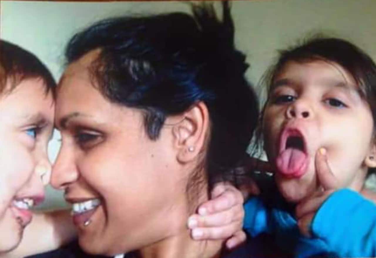 Adeline Yvette Wilson-Rigney with her two children, Korey Micthell and Amber Rose.