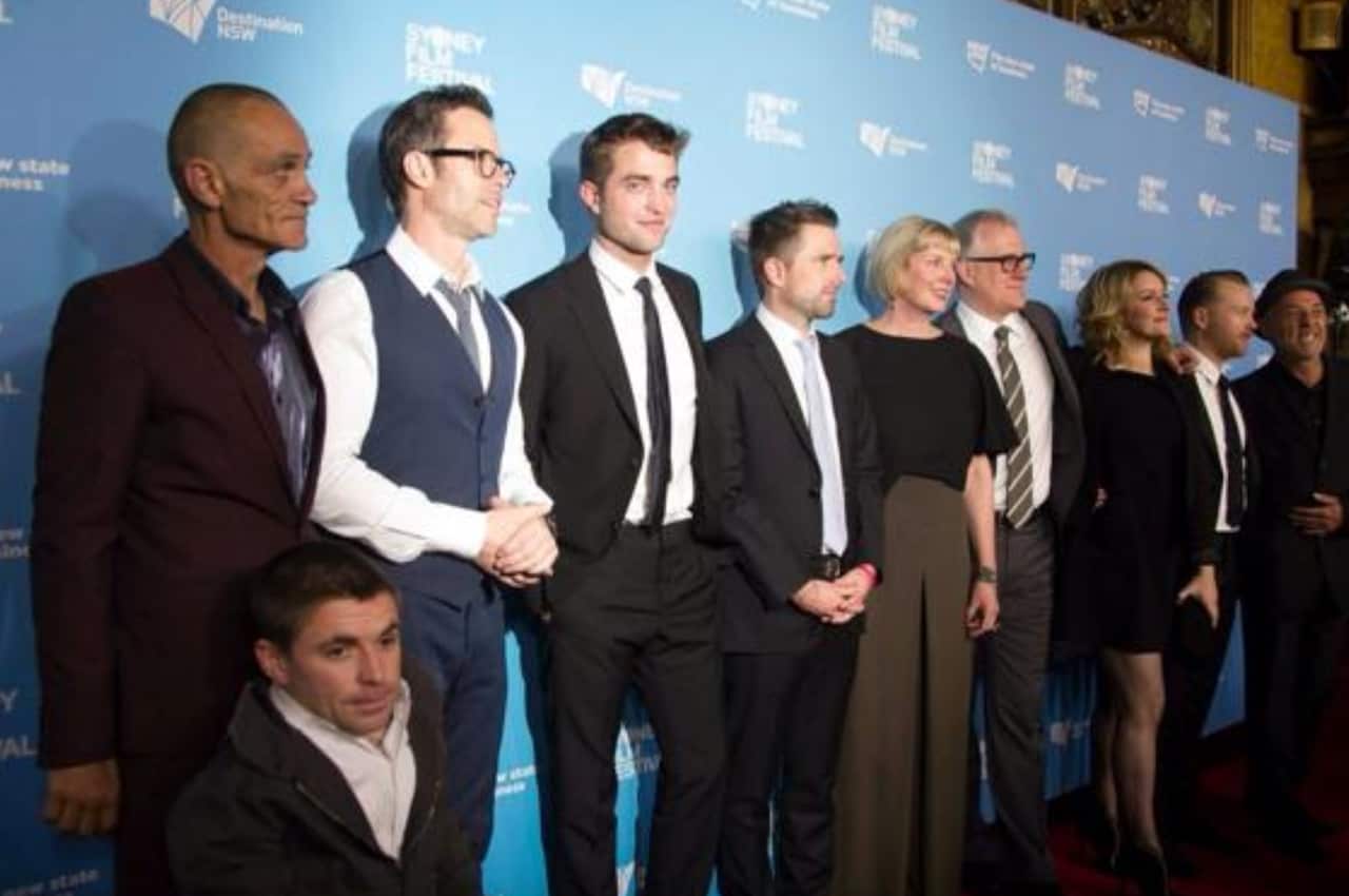 Richard Green alongside Guy Pearce, Robert Pattinson and other co-stars at the Sydney premiere of the 2014 movie, The Rover.
