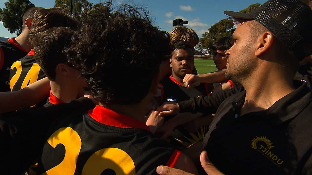 The Tjindu Foundation team during a 3-quarter time break.