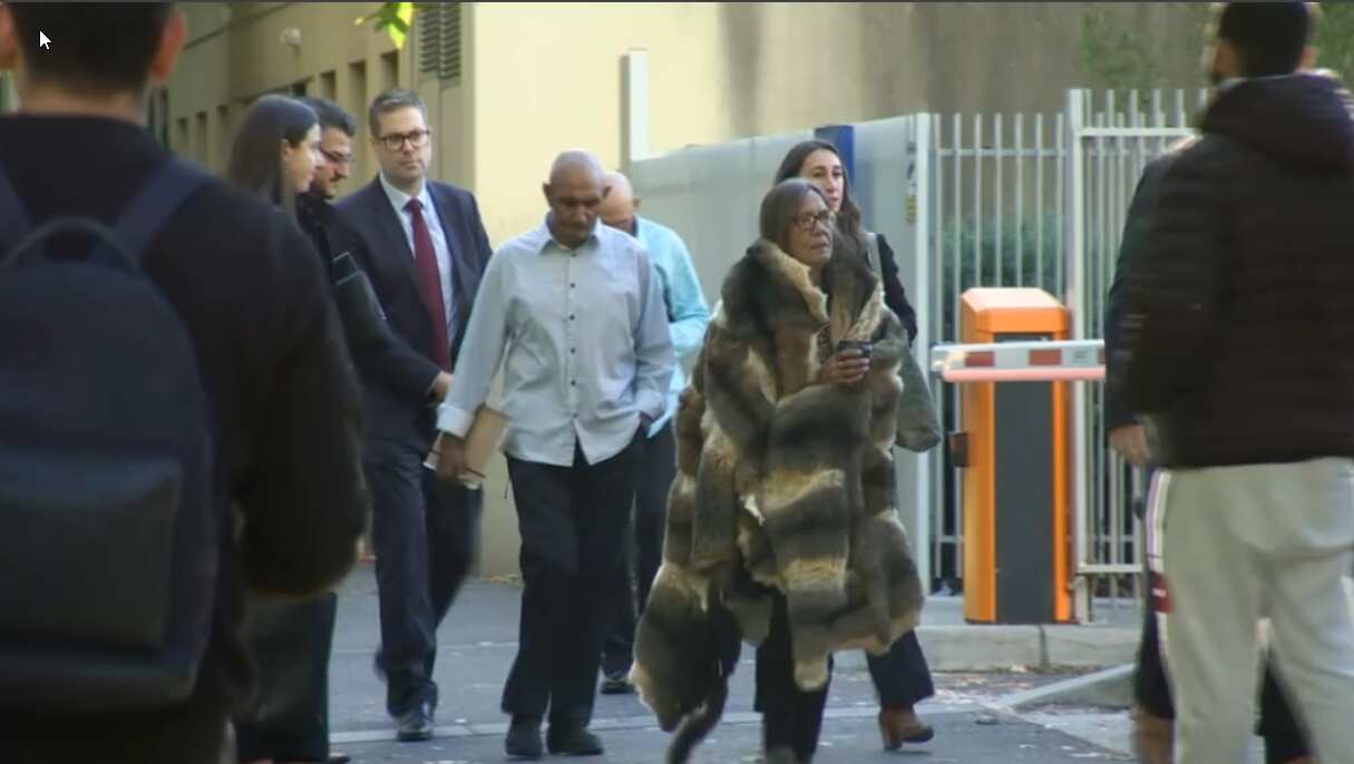 The mother of Veronica Nelson, Aunty Donna arrives to the inquest with Veronica's partner, Percy Lovett 
