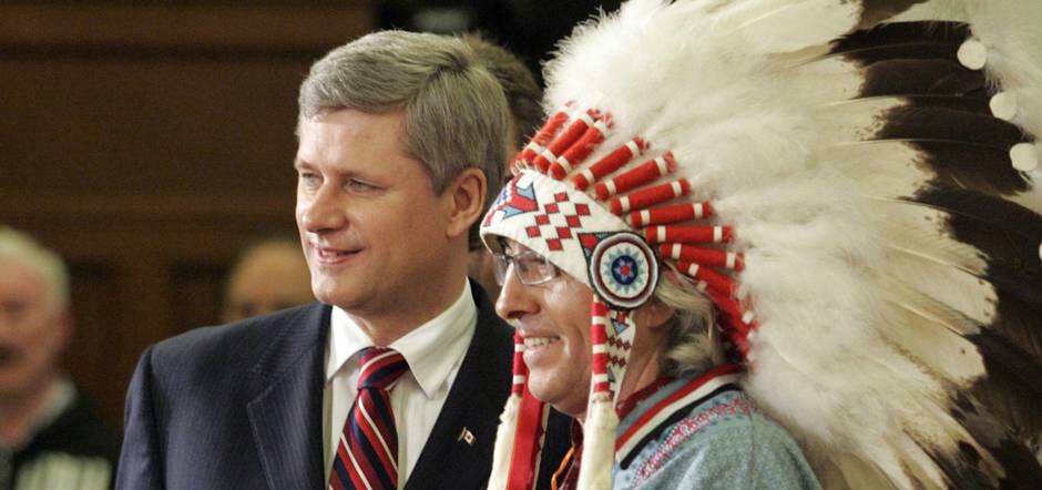 Former Canadian Prime Minister, Stephen Harper with national chief Phil Fontaine on the National Apology
