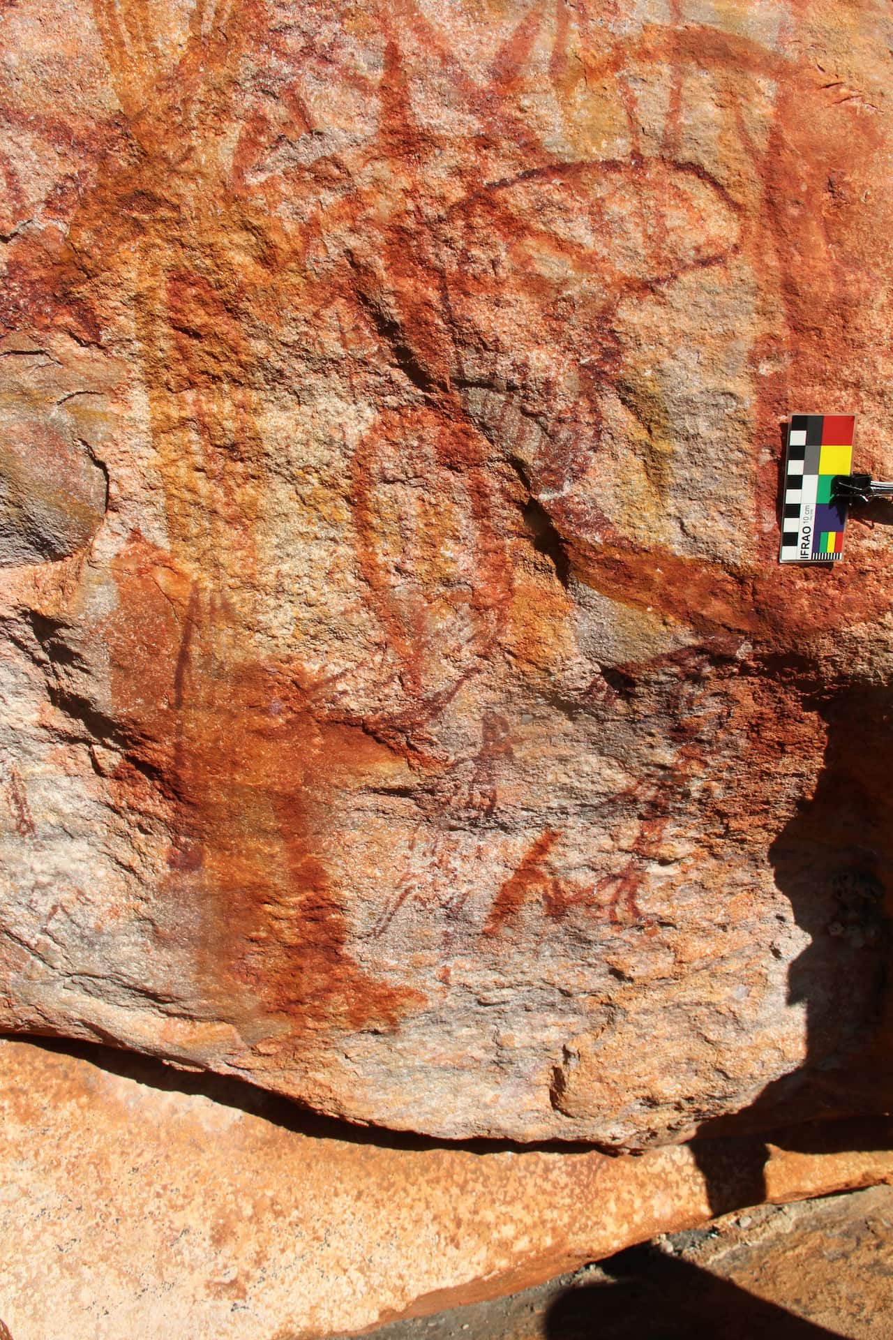 Large male Maliwawa human figures from an Awunbarna site. The largest male is 1.15 metres wide by 1.95 metres high.