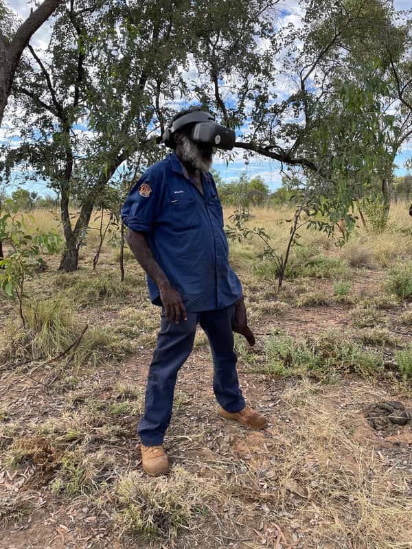 Nyikina Mangala Ranger William Watson using drone vision goggles to search for wiliji in caves on the Erskine Range.