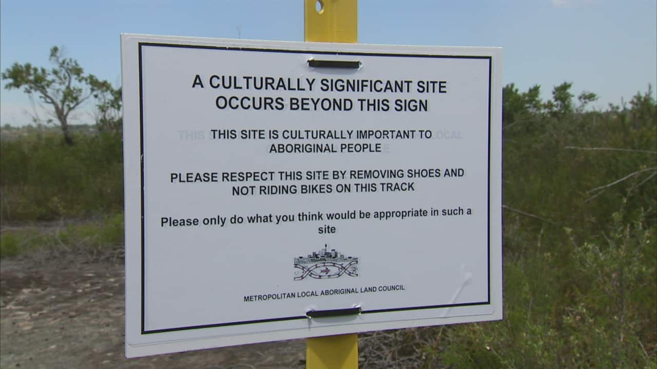 Sign at the entrance of the site, explaining its significance.
