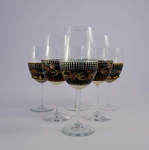 Noongarr/Yamagii artist Brett Hansen has created a bespoke collection of Emu egg wine glasses featuring his original art