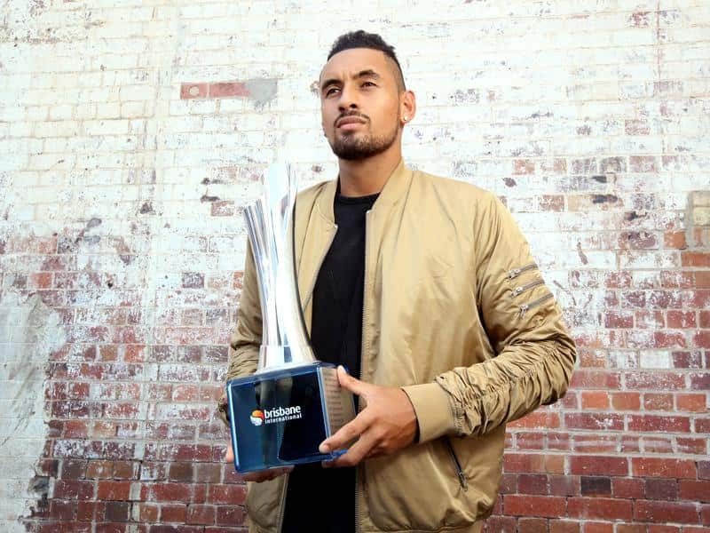 Tennis player Nick Kyrgios poses for the media