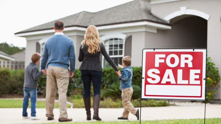 Family looking at house for sale