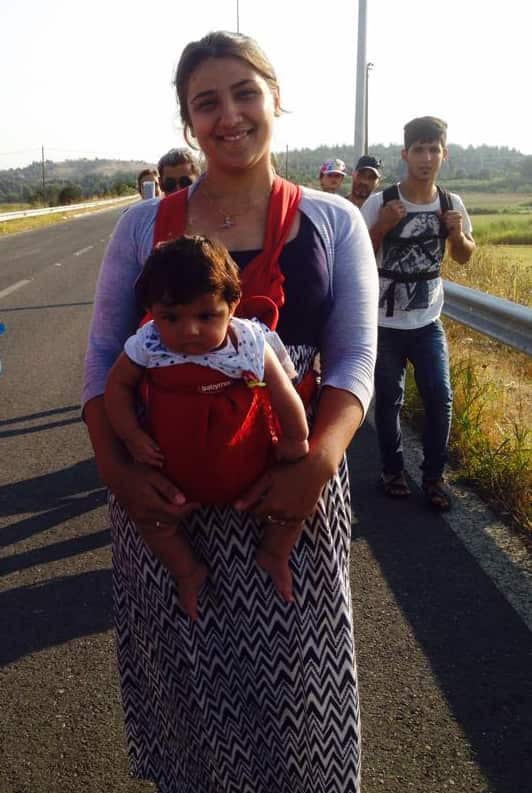 Ronak with baby Aya at the Macedonian border