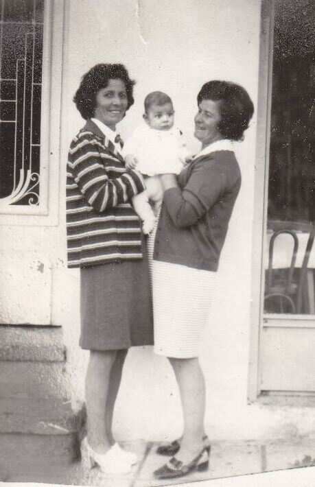 Papathanasiou as a baby in Florina with his aunt (left) and adoptive mum.