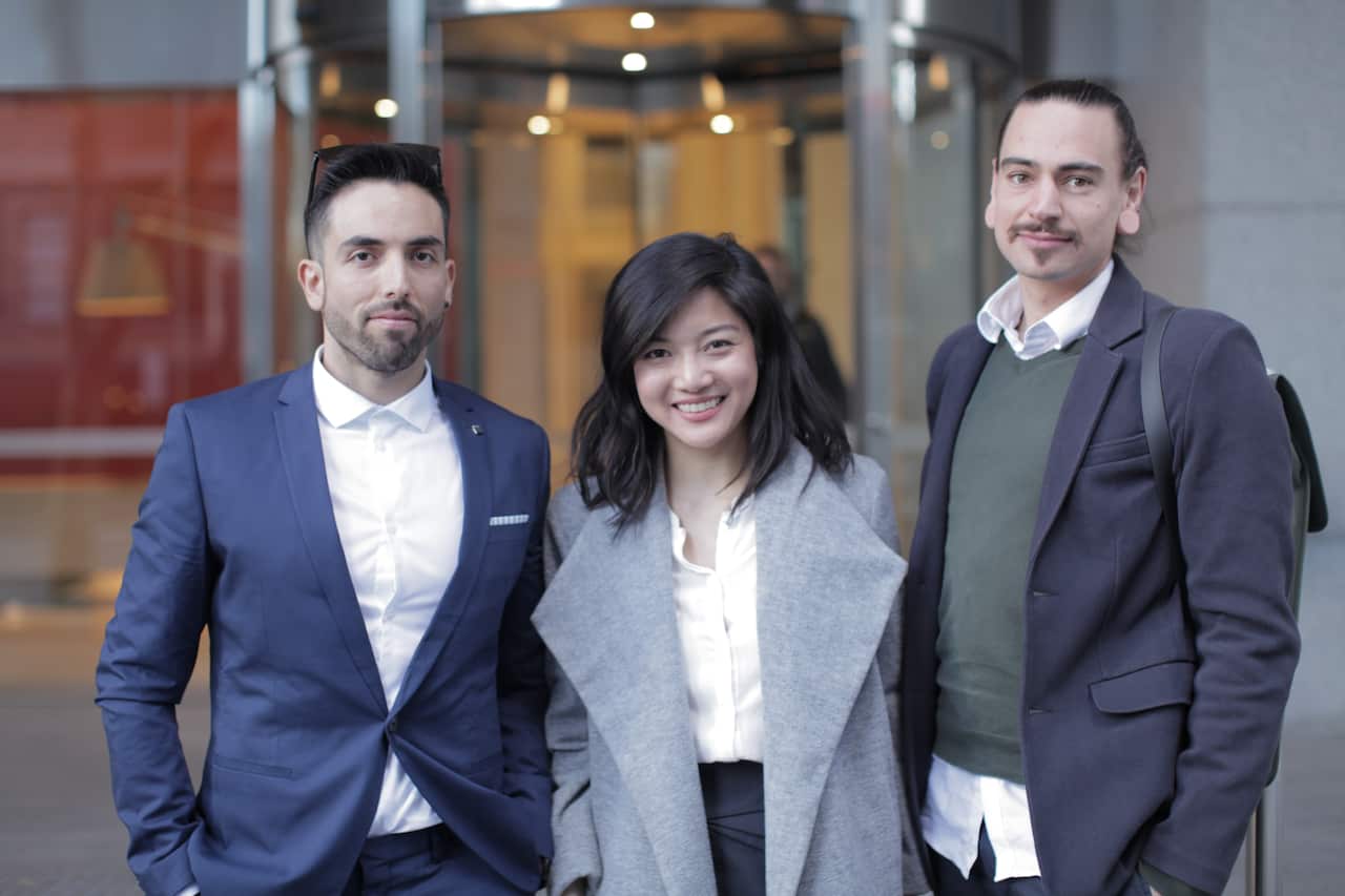 Luciano and Drew with their immigration lawyer, Yunn Chen.