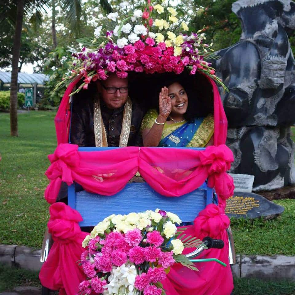 Uma and her partner at their wedding.
