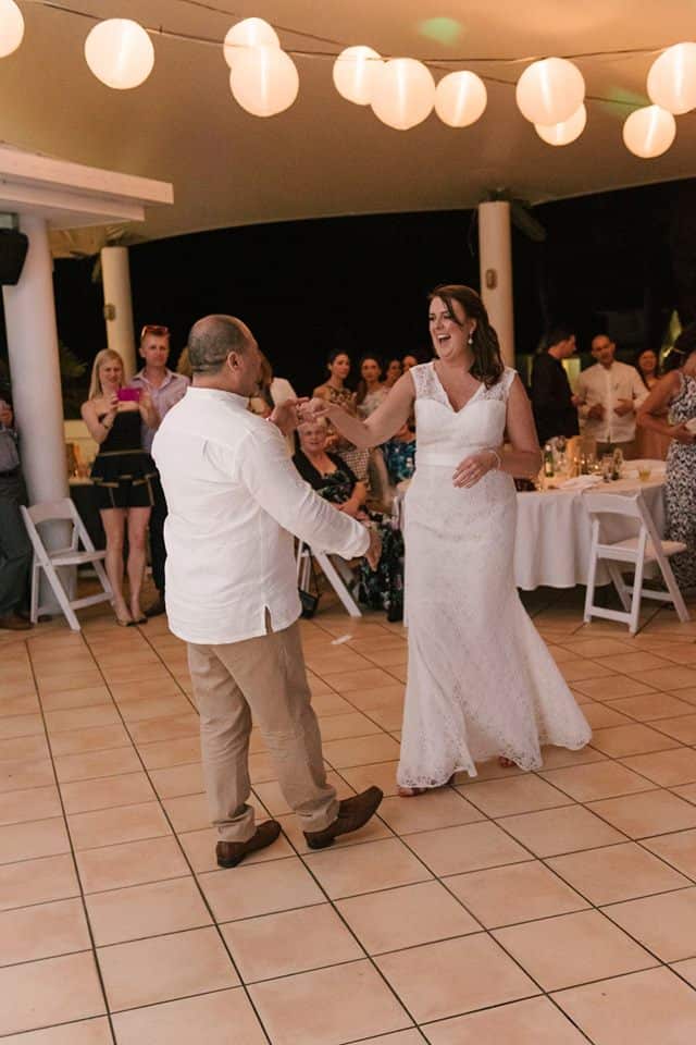 Greer and her husband at their wedding.