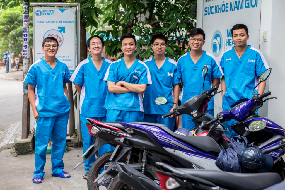 “LGBT is normal”: The Men’s Health Vietnam team pictured outside their clinic. Photo by Jeremy Smart.