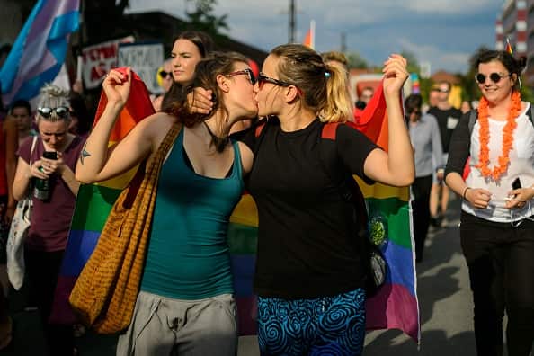 Women kiss as they take part in the Ljubljana Pride Parade in Ljubljana, Slovenia, on June 18, 2016. / AFP / JURE MAKOVEC        (Photo credit should read JURE MAKOVEC/AFP/Getty Images)