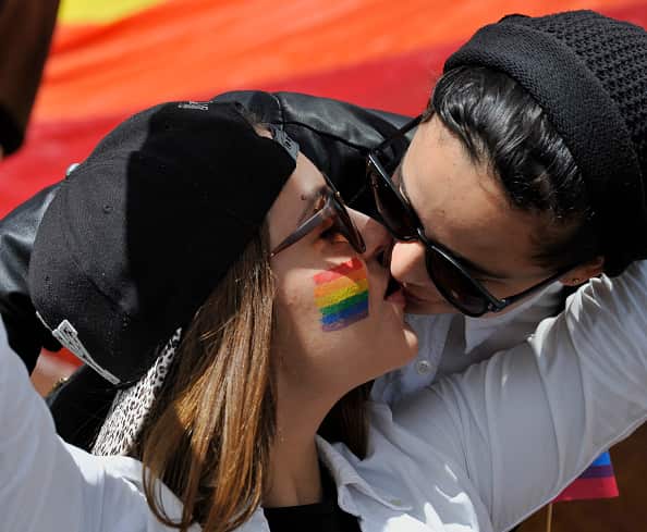 Revelers take part in the Gay Pride Parade in Bogota, on July 3, 2016. / AFP / GUILLERMO LEGARIA        (Photo credit should read GUILLERMO LEGARIA/AFP/Getty Images)