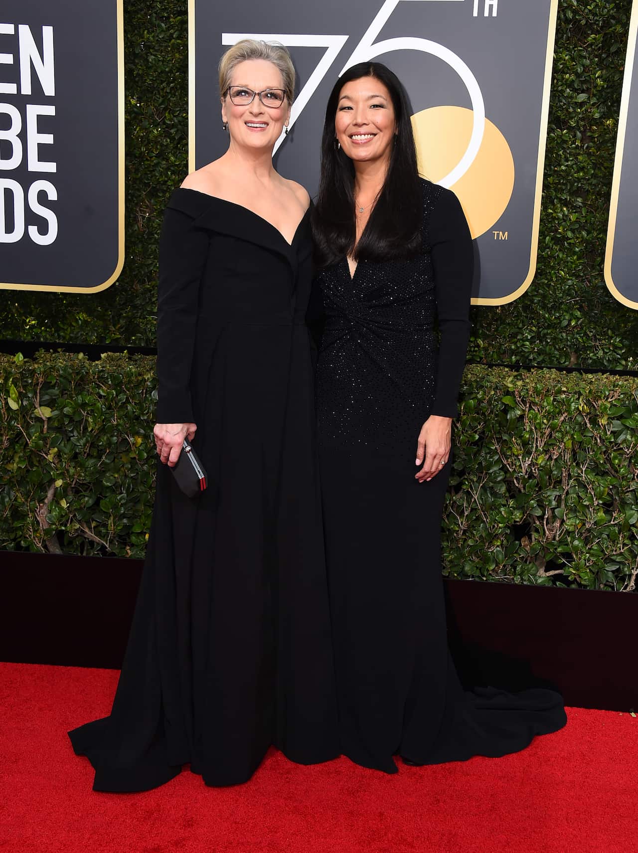 Meryl Streep, left, and Ai-jen Poo arrive at the 75th annual Golden Globe Awards at the Beverly Hilton Hotel on Sunday, Jan. 7, 2018, in Beverly Hills, Calif. (Photo by Jordan Strauss/Invision/AP)