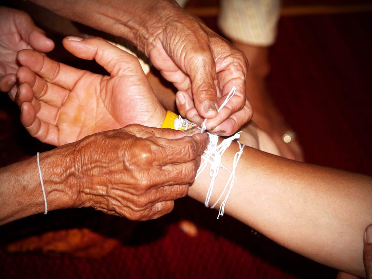 grandmother hands communication Tok Pisin