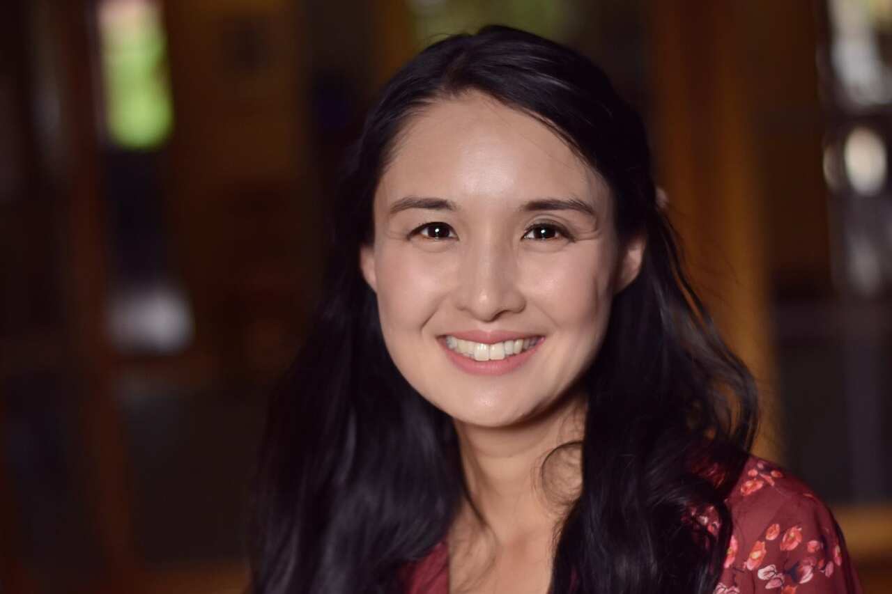 Alice Pung smiling and looking at camera