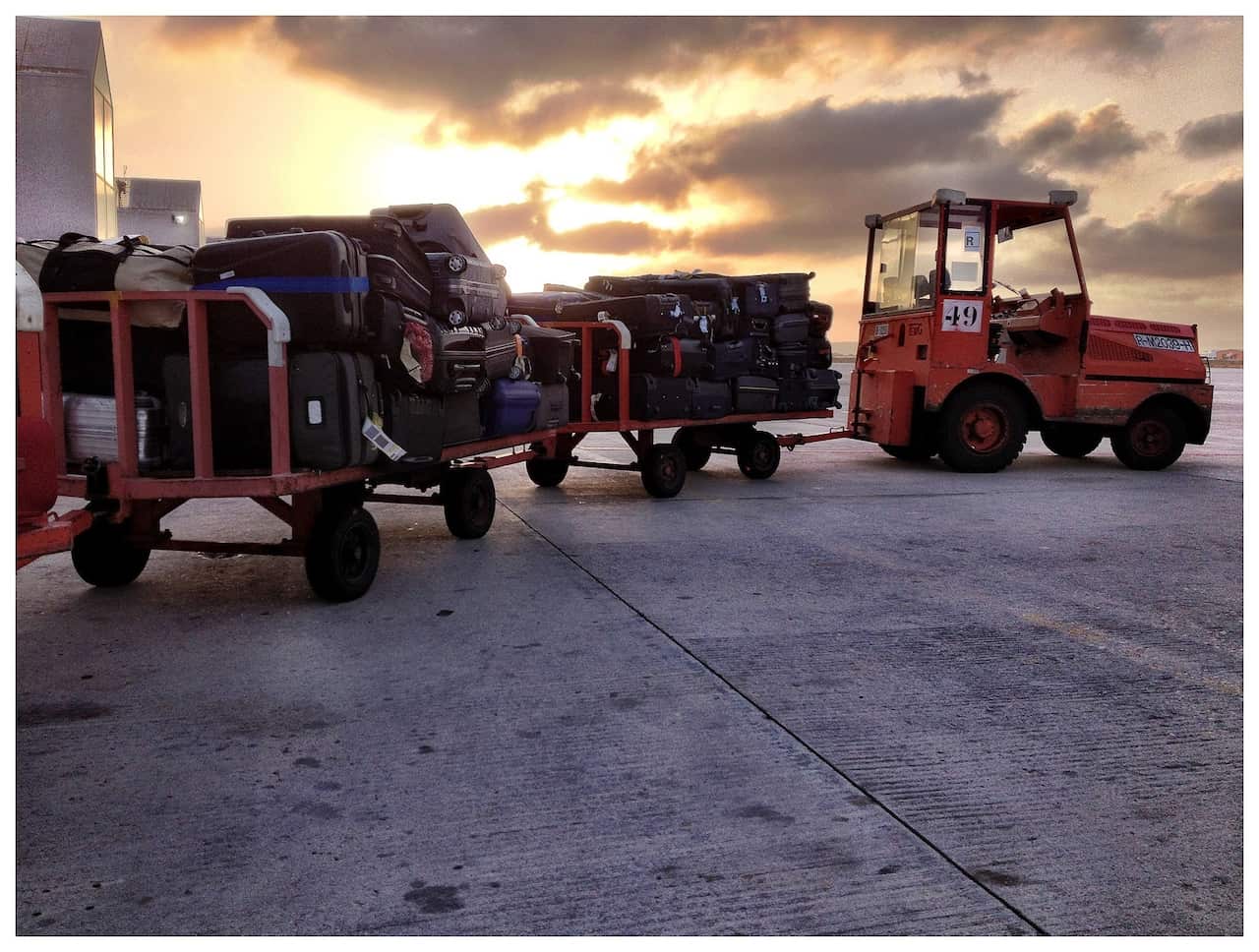 Cart With Luggage In Airport