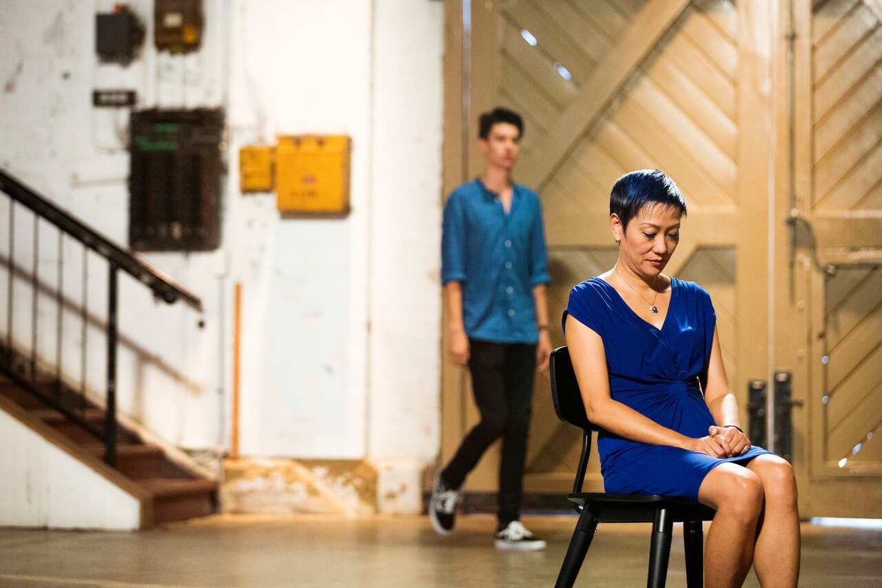 Carl walks into the room, ready to see his mother Jenny once again. 