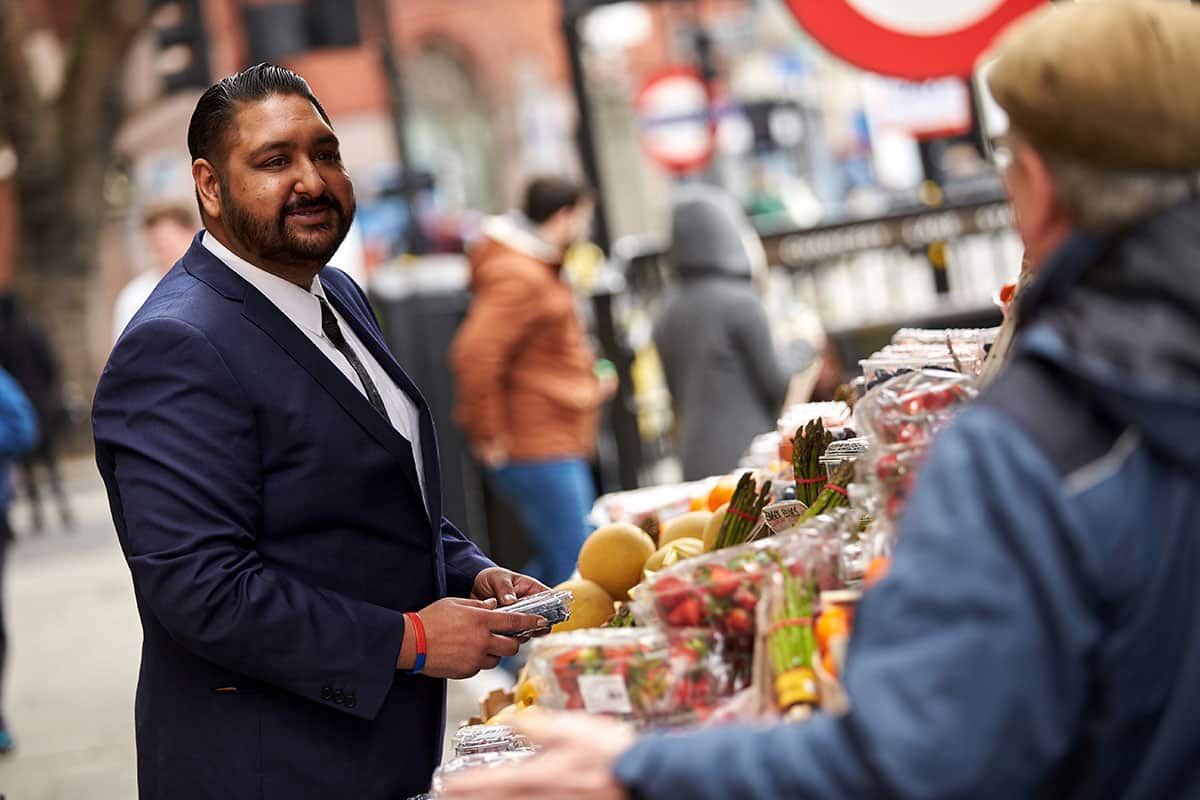 Man buying fruit