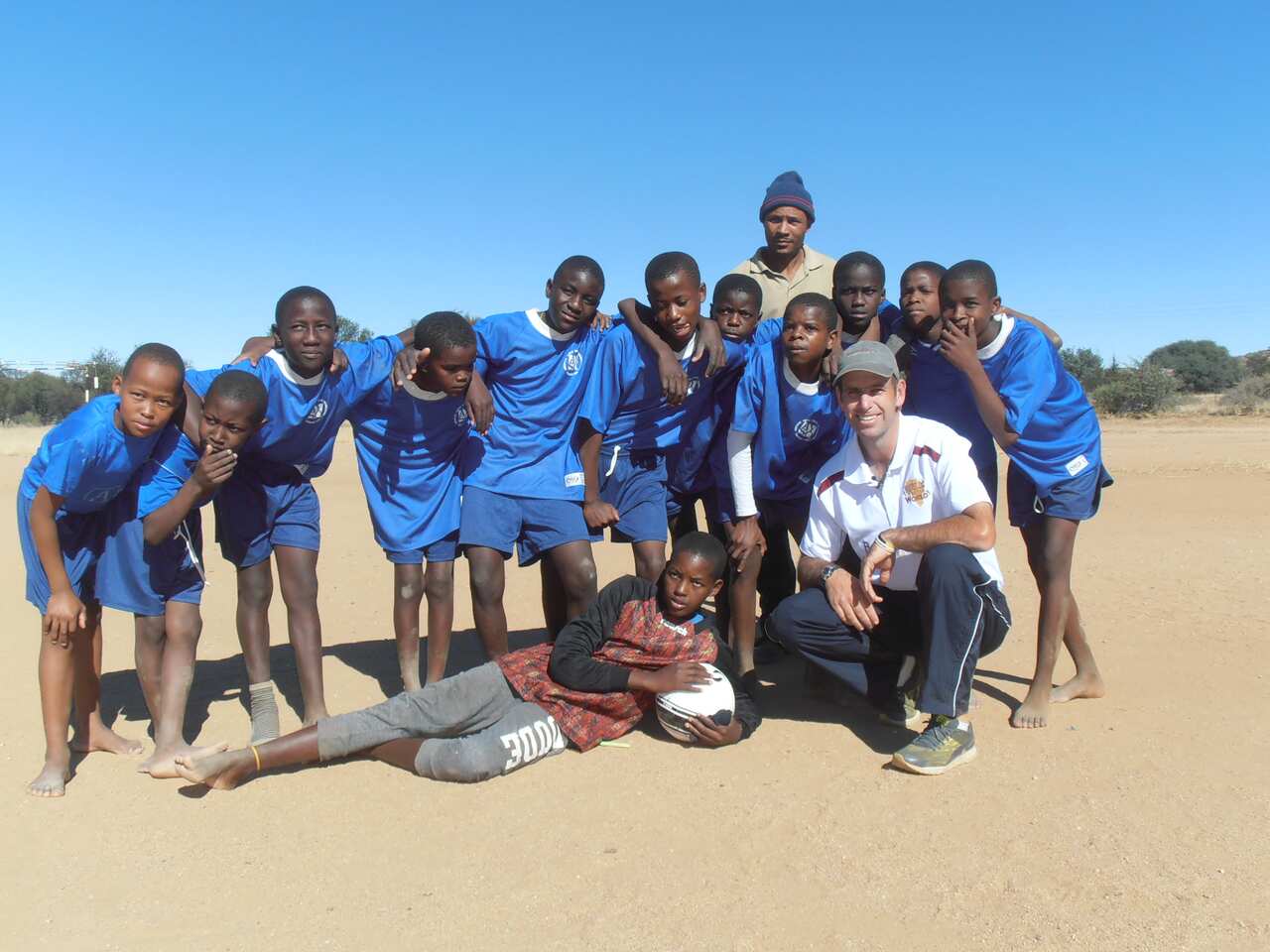 Matt Napier with a soccer team in Malawi who received some donated soccer balls.
