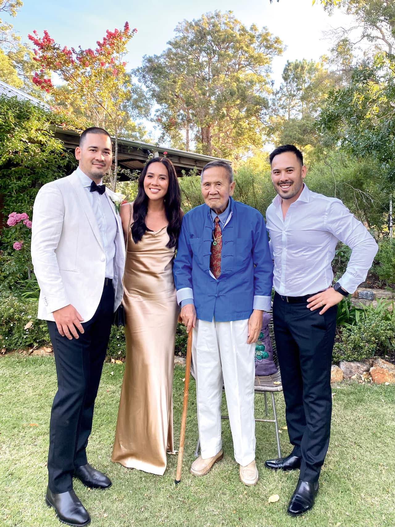 Mimi Kwa with her Dad and brothers.